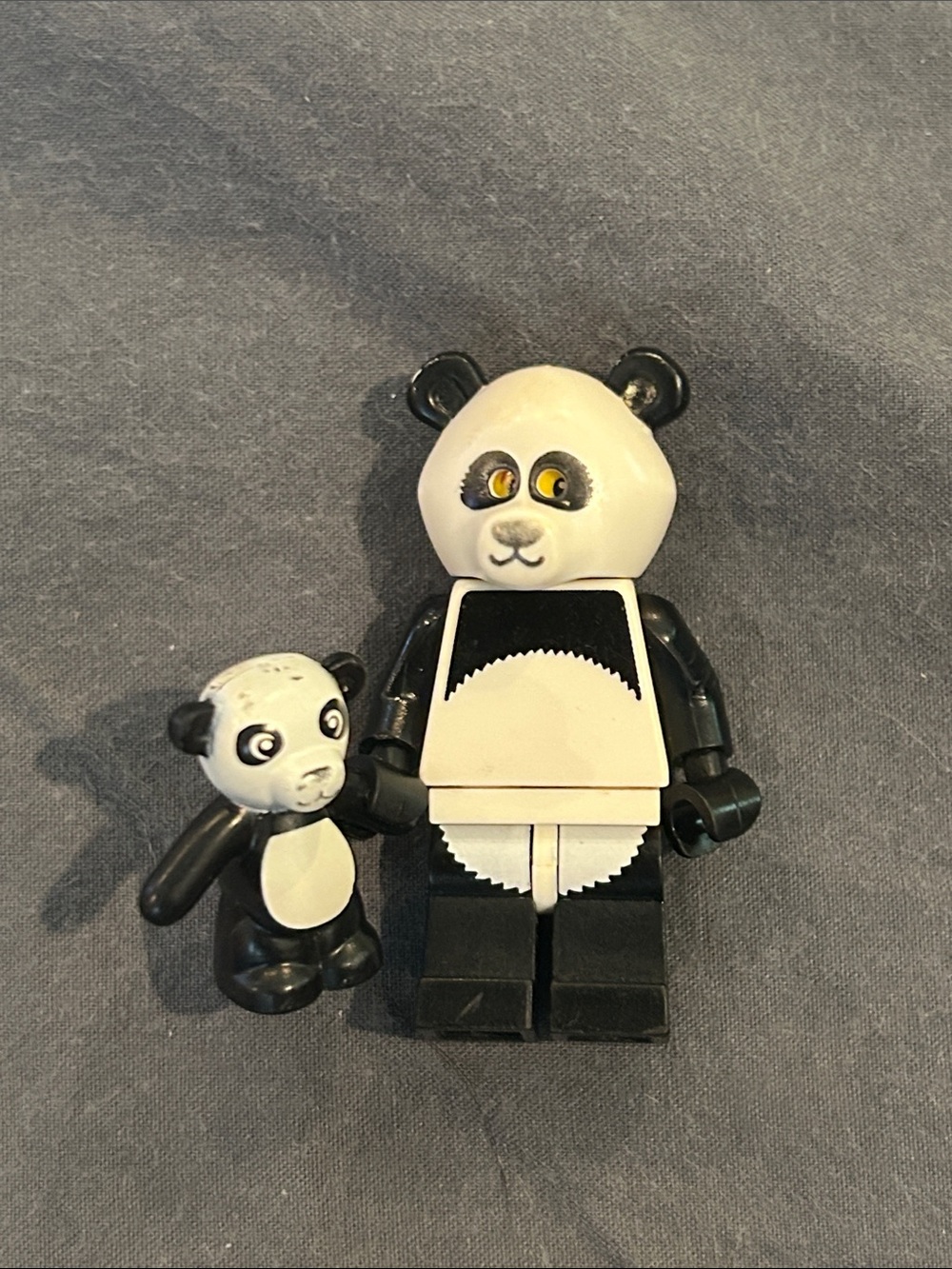 Lego panda costume minifigure with teddy bear